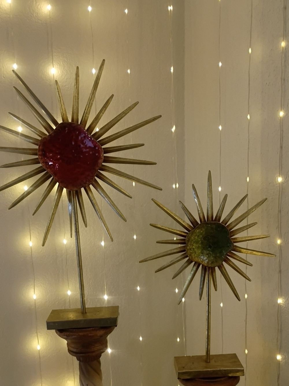 Metal Sunburst Sculptures with Red and Green Centers